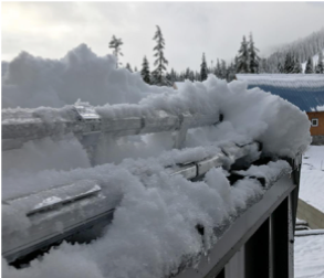 S-5 X-Gard 2.0 snow guard system with snow covering the metal roof